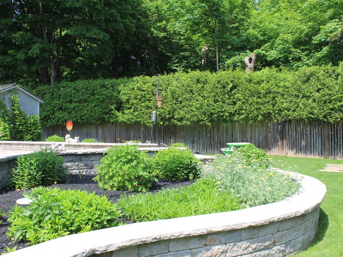 Retaining wall and raised garden beds by Spring ECO Construction, Barrie Ontario